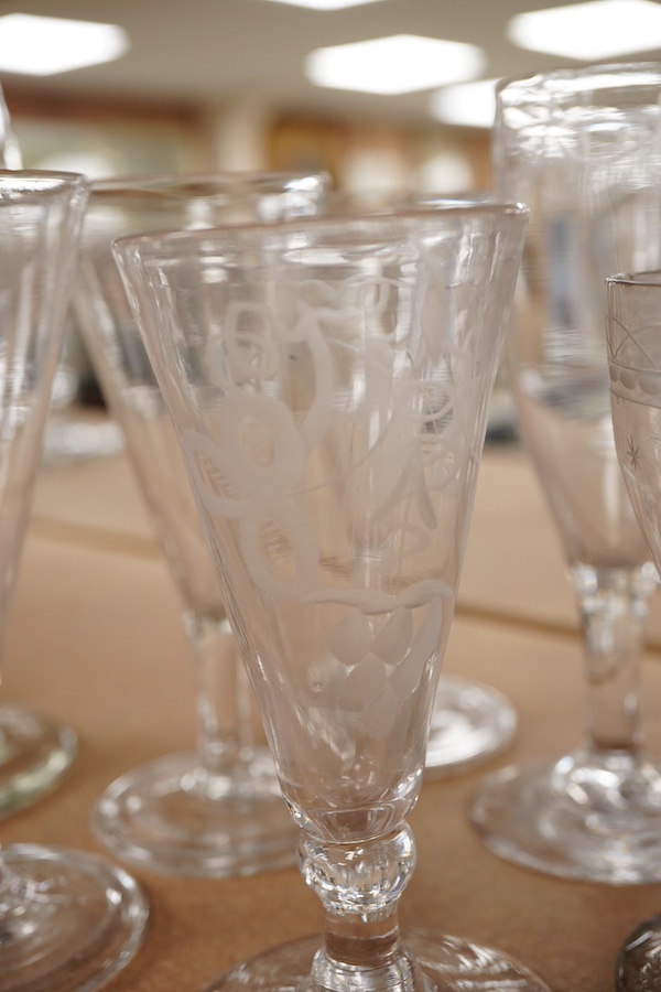 A a set of three early 19th century ale glasses with folded feet, together with two additional engraved ale glasses, a knopped rummer and another, tallest 18cm